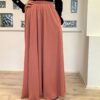 Ontdek de Double Cloche Rok Al Nur in Koraal bij Osrati Boutique. Een elegante, volle rok in een opvallende koraalkleur, perfect voor elke gelegenheid.